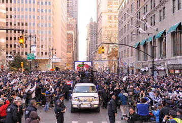 NEW YORK - NOVEMBER 06:  Derek Jeter # 2 and Jorge Posada # 20 of the New York Yankees celebrate on a float during the Yankees World Series Victory Parade on November 6, 2009 in New York City.  (Photo by Michael Loccisano/Getty Images)