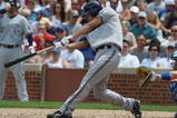 CHICAGO - JULY 03:  J.J. Hardy #7 of the Milwaukee Brewers at bat against the Chicago Cubs during their MLB game on July 3, 2009 at Wrigley Field in Chicago, Illinois. (Photo by Jonathan Daniel/Getty Images) 
