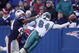 22 Dec 2001 : Chris Chambers #84 of the Miami Dolphins dives to catch a pass under pressure from Ty Law #24 of the New England Patriots during the game at Foxboro Stadium in Foxboro, Massachusetts. The Patriots defeated the Dolphins 20-13. DIGITAL IMAGE. Mandatory Credit: Ezra Shaw/Getty Images