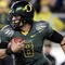EUGENE, OR - OCTOBER 31: Quarterback Jeremiah Masoli #8 of the Oregon Ducks runs with the ball in the second quarter of the game against the USC Trojans at Autzen Stadium on October 31, 2009 in Eugene, Oregon. Masoli threw for 222 yards and a touchdown and ran for 164 more yards with another score as Oregon defeated USC 47-20. (Photo by Steve Dykes/Getty Images)