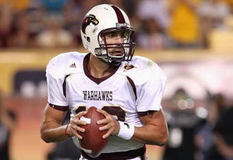 TEMPE, AZ - SEPTEMBER 19:  Quarterback Trey Revell #12 of the Louisiana Monroe Warhawks scrambles with the ball during the college football game against the Arizona State Sun Devils at Sun Devil Stadium on September 19, 2008 in Tempe, Arizona. The Sun Devils defeated the Warhawks 38-14.  (Photo by Christian Petersen/Getty Images)