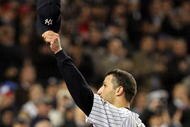 NEW YORK - NOVEMBER 04:  Andy Pettitte #46 of the New York Yankees tips his hat to the crowd as he was taken out of the game in the top of the sixth inning against the Philadelphia Phillies in Game Six of the 2009 MLB World Series at Yankee Stadium on November 4, 2009 in the Bronx borough of New York City.  (Photo by Jed Jacobsohn/Getty Images)