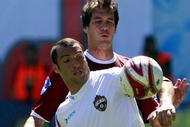 KHIMKI, RUSSIA - MAY 31: Cesar Navas (R) of FC Rubin Kazan battles for the ball with Daniel Carvalho of PFC CSKA Moscow during the Russian Cup final match between FC Rubin Kazan and PFC CSKA Moscow at the Khimki Stadium on May 31, 2009 in Khimki, Russia.  (Photo by Dmitry Korotayev/Epsilon/Getty Images)