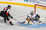BUFFALO, NY - NOVEMBER 06: Ryan Miller #30 of the Buffalo Sabres makes a save on a deflection by Jeff Carter #17 of the Philadelphia Flyers at HSBC Arena on November 6, 2009 in Buffalo, New York. (Photo by Rick Stewart/Getty Images)