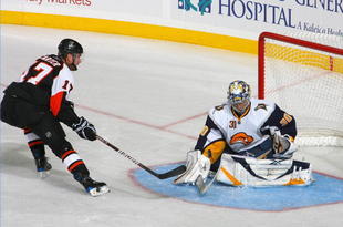 BUFFALO, NY - NOVEMBER 06: Ryan Miller #30 of the Buffalo Sabres makes a save on a deflection by Jeff Carter #17 of the Philadelphia Flyers at HSBC Arena on November 6, 2009 in Buffalo, New York.  (Photo by Rick Stewart/Getty Images)