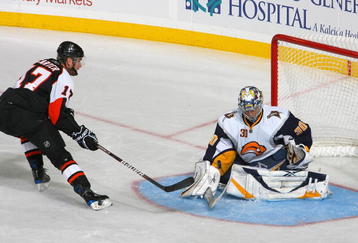 BUFFALO, NY - NOVEMBER 06: Ryan Miller #30 of the Buffalo Sabres makes a save on a deflection by Jeff Carter #17 of the Philadelphia Flyers at HSBC Arena on November 6, 2009 in Buffalo, New York.  (Photo by Rick Stewart/Getty Images)