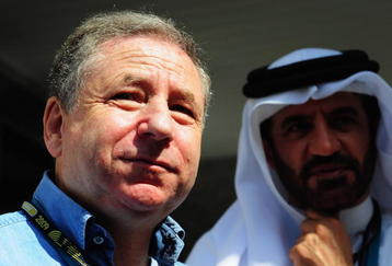 ABU DHABI, UNITED ARAB EMIRATES - OCTOBER 31:  New F.I.A. President Jean Todt is interviewed in the pitlane before qualifying for the Abu Dhabi Formula One Grand Prix at the Yas Marina Circuit on October 31, 2009 in Abu Dhabi, United Arab Emirates.  (Photo by Clive Mason/Getty Images)