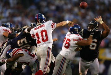 SAN DIEGO, CA -  SEPTEMBER 25:   Eli Manning #10 of the New York Giants throws a pass during the NFL game with the San Diego Chargers on September 25, 2005 at Qualcomm Stadium in San Diego, California. The Giants won 45-23.  (Photo by Donald Miralle/Getty Images)