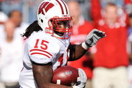 COLUMBUS, OH - OCTOBER 10: Linebacker Culmer St. Jean#15 of the Wisconsin Badgers runs with the ball against the Ohio State Buckeyes at Ohio Stadium on October 10, 2009 in Columbus, Ohio. (Photo by Jamie Sabau/Getty Images)