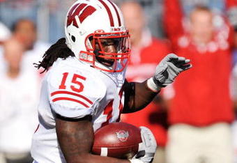 COLUMBUS, OH - OCTOBER 10:  Linebacker Culmer St. Jean#15 of the Wisconsin Badgers runs with the ball against the Ohio State Buckeyes at Ohio Stadium on October 10, 2009 in Columbus, Ohio.  (Photo by Jamie Sabau/Getty Images)