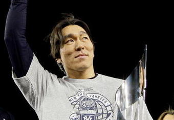 NEW YORK - NOVEMBER 4:  World Series MVP Hideki Matsui #55 of the New York Yankees celebrates with the MVP trophy after their 7-3 win against the Philadelphia Phillies in Game Six of the 2009 MLB World Series at Yankee Stadium on November 4, 2009 in the Bronx borough of New York City.  (Photo by David J. Phillip-Pool/Getty Images)
