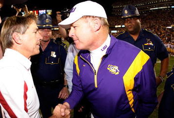 BATON ROUGE, LA - NOVEMBER 08:  Head Coach Nick Saban of the Alabama Crimson Tide is congratulated by head coach Les Miles of the Louisiana State University Tigers after the Tide defeated the Tigers 27-21 in overtime on November 11, 2008 at Tiger Stadium in Baton Rouge, Louisiana.  (Photo by Chris Graythen/Getty Images)