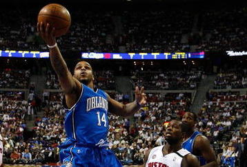AUBURN HILLS, MI - MAY 13:  Jameer Nelson #14 of the Orlando Magic drives for a shot attempt against Rodney Stuckey #3 of the Detroit Pistons in Game Five of the Eastern Conference Semifinals during the 2008 NBA Playoffs at the Palace of Auburn Hills in Auburn Hills, Michigan.  NOTE TO USER: User expressly acknowledges and agrees that, by downloading and or using this photograph, User is consenting to the terms and conditions of the Getty Images License Agreement.  (Photo by Gregory Shamus/Getty Images)