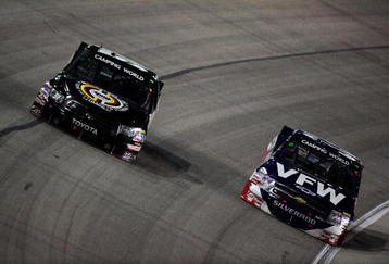 FORT WORTH, TX - NOVEMBER 06:  Kyle Busch, driver of the #51 Miccosukee Resort/Graceway Toyota, races Ron Hornaday Jr., driver of the #33 VFW Chevrolet, during the NASCAR Camping World Truck Series WinStar World Casino 350 at Texas Motor Speedway on November 6, 2009 in Fort Worth, Texas.  (Photo by Robert Laberge/Getty Images for NASCAR)