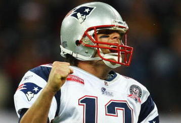 LONDON, ENGLAND - OCTOBER 25:  Tom Brady (#12) of the New England Patriots celebrates during the NFL International Series match between New England Patriots and Tampa Bay Buccaneers at Wembley Stadium on October 25, 2009 in London, England. This is the third occasion where a regular season NFL match has been played in London.  (Photo by Julian Finney/Getty Images)