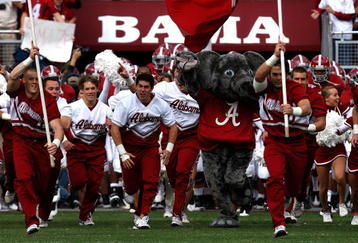 TUSCALOOSA, AL - OCTOBER 24:  The cheerleaders of the Alabama Crimson Tide lead the team onto the field to face the Tennessee Volunteers at Bryant-Denny Stadium on October 24, 2009 in Tuscaloosa, Alabama.  (Photo by Kevin C. Cox/Getty Images)