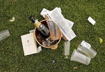 ASCOT, UNITED KINGDOM - JUNE 20:  A empty champagne bottle lies in a bucket on the ground after the first day of Royal Ascot, at the Ascot Racecourse on June 20, 2006 in Ascot, England.  The event has been one of the highlights of the racing and social calendar since 1711, and the royal patronage continues today with a Royal Procession taking place in front of the grandstands daily.  (Photo by Scott Barbour/Getty Images)