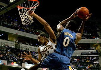 INDIANAPOLIS - OCTOBER 31:   Courtney Sims #44 of the Indiana Pacers  collides with Gilbert Arenas #0 of the Washington Wizards October 31, 2007 at Conseco Fieldhouse in Indianapolis, Indiana.  NOTE TO USER: User expressly acknowledges and agrees that, by downloading and/or using this Photograph, user is consenting to the terms and conditions of the Getty Images License Agreement. (Photo by Matthew Stockman/Getty Images)  