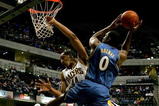 INDIANAPOLIS - OCTOBER 31:   Courtney Sims #44 of the Indiana Pacers  collides with Gilbert Arenas #0 of the Washington Wizards October 31, 2007 at Conseco Fieldhouse in Indianapolis, Indiana.  NOTE TO USER: User expressly acknowledges and agrees that, by downloading and/or using this Photograph, user is consenting to the terms and conditions of the Getty Images License Agreement. (Photo by Matthew Stockman/Getty Images)  