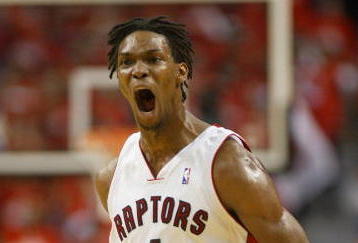 TORONTO,ON - APRIL 24:  Chris Bosh #4 of the Toronto Raptors shows his excitement against the Orlando Magic in Game 3 of the Eastern Conference Quarterfinals on April 24, 2008 at the Air Canada Centre in Toronto, Ontario. The Raptors defeated the Magic 108-94. (Photo by Claus Andersen/Getty Images)