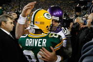 GREEN BAY, WI - NOVEMBER 1: Quarterback Brett Favre #4 of the Minnesota Vikings hugs a Donald Driver #80 of the Green Bay Packers at Lambeau Field on November 1, 2009 in Green Bay, Wisconsin. The Vikings defeated the Packers 38-26. (Photo by Scott Boehm/Getty Images)