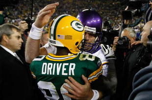 GREEN BAY, WI - NOVEMBER 1: Quarterback Brett Favre #4 of the Minnesota Vikings hugs a Donald Driver #80 of the Green Bay Packers at Lambeau Field on November 1, 2009 in Green Bay, Wisconsin. The Vikings defeated the Packers 38-26. (Photo by Scott Boehm/Getty Images)