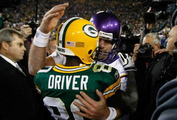 GREEN BAY, WI - NOVEMBER 1: Quarterback Brett Favre #4 of the Minnesota Vikings hugs a Donald Driver #80 of the Green Bay Packers at Lambeau Field on November 1, 2009 in Green Bay, Wisconsin. The Vikings defeated the Packers 38-26. (Photo by Scott Boehm/Getty Images)