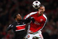 LONDON, ENGLAND - NOVEMBER 04: Kieran Gibbs of Arsenal beats Jeremain Lens of AZ Alkmaar to the header during the UEFA Champions League Group H match between Arsenal and AZ Alkmaar at the Emirates Stadium on November 4, 2009 in London, England. (Photo by Phil Cole/Getty Images)