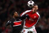 LONDON, ENGLAND - NOVEMBER 04:  Kieran Gibbs of Arsenal beats Jeremain Lens of AZ Alkmaar to the header during the UEFA Champions League Group H match between Arsenal and AZ Alkmaar at the Emirates Stadium on November 4, 2009 in London, England.  (Photo by Phil Cole/Getty Images)