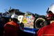 TALLADEGA, AL - NOVEMBER 01:  Safety workers look over the #39 U.S Army Chevrolet, driven by Ryan Newman, during the NASCAR Sprint Cup Series AMP Energy 500 at Talladega Superspeedway on November 1, 2009 in Talladega, Alabama.  (Photo by Rusty Jarrett/Getty Images for NASCAR)