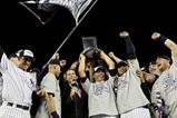 NEW YORK - NOVEMBER 04:  The New York Yankees celebrate after their 7-3 win against the Philadelphia Phillies in Game Six of the 2009 MLB World Series at Yankee Stadium on November 4, 2009 in the Bronx borough of New York City.  (Photo by Pool/Getty Images)