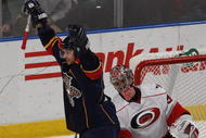 SUNRISE, FL - NOVEMBER 4: Steven Reinprecht #27 of the Florida Panthers celebrates after scoring a goal against Cam Ward #30 of the Carolina Hurricanes in the3 third period on November 4, 2009 at the BankAtlantic Center in Sunrise, Florida. The Panthers defeated the Hurricanes 3-0. (Photo by Joel Auerbach/Getty Images)
