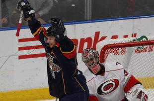 SUNRISE, FL - NOVEMBER 4: Steven Reinprecht #27 of the Florida Panthers celebrates after scoring a goal against Cam Ward #30 of the Carolina Hurricanes in the3 third period on November 4, 2009 at the BankAtlantic Center in Sunrise, Florida. The Panthers defeated the Hurricanes 3-0. (Photo by Joel Auerbach/Getty Images)