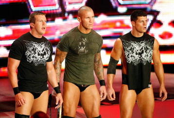 LAS VEGAS - AUGUST 24:  (L-R) Wrestlers Ted DiBiase, Randy Orton and Cody Rhodes appear during the WWE Monday Night Raw show at the Thomas & Mack Center August 24, 2009 in Las Vegas, Nevada.  (Photo by Ethan Miller/Getty Images)