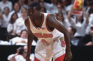 9 Jan 2002:  Guard Earl Badu #4 of the Maryland Terrapins readies to defend against the North Carolina Tarheels during the ACC Conference basketball game at Cole Field House in College Park, Maryland.  Maryland crushed North Carolina 112-79.  Mandatory Credit:  Doug Pensinger /Getty Images