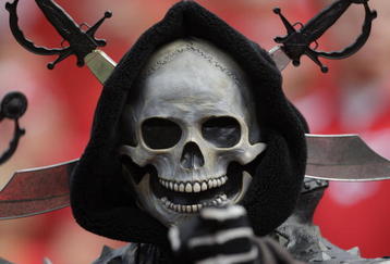 KANSAS CITY, MO - SEPTEMBER 20:  An Oakland Raiders fan looks on during the game against the Kansas City Chiefs at Arrowhead Stadium on September 20, 2009 in Kansas City, Missouri. (Photo by Jamie Squire/Getty Images)