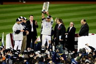 NEW YORK - NOVEMBER 04:  Alex Rodriguez #13 of the New York Yankees celebrates with the trophy after their 7-3 win against the Philadelphia Phillies in Game Six of the 2009 MLB World Series at Yankee Stadium on November 4, 2009 in the Bronx borough of New York City.  (Photo by Al Bello/Getty Images)