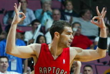 EAST RUTHERFORD, NJ - MAY 04:  Jose Calderon #8 of the Toronto Raptors reacts after a three pointer against the New Jersey Nets in Game Six of the Eastern Conference Quarterfinals during the 2007 NBA Playoffs on May 4, 2007 at the Continental Airlines Arena at the Meadowlands in East Rutherford, New Jersey. NOTE TO USER: User expressly acknowledges and agrees that, by downloading and or using this photograph, User is consenting to the terms and conditions of the Getty Images License Agreement.  (Photo by Jim McIsaac/Getty Images)