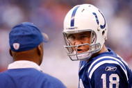 INDIANAPOLIS - NOVEMBER 01: Peyton Manning #18 of the Indianapolis Colts talks with Head Coach Jim Caldwell during the NFL game against the San Francisco 49ers at Lucas Oil Stadium on November 1, 2009 in Indianapolis, Indiana. (Photo by Andy Lyons/Getty Images)