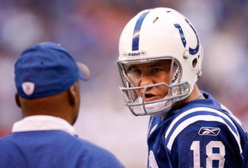 INDIANAPOLIS - NOVEMBER 01:  Peyton Manning #18 of the Indianapolis Colts talks with Head Coach Jim Caldwell during the NFL game against the San Francisco 49ers at Lucas Oil Stadium on November 1, 2009 in Indianapolis, Indiana.  (Photo by Andy Lyons/Getty Images)