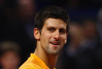 BASEL, SWITZERLAND - NOVEMBER 07:  Novak Djokovic of Serbia celebrates defeating Radek Stepanek of Czech Republic during Day Six of the Davidoff Swiss Indoors Tennis at St Jakobshalle on November 7, 2009 in Basel, Switzerland.  (Photo by Julian Finney/Getty Images)