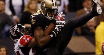 NEW ORLEANS - NOVEMBER 2:  Marques Colston #12 of the New Orleans Saints catches a pass for a touchdown against Tye Hill #24 of the Atlanta Falcons during the second quarter of the game at the Louisiana Superdome on November 2, 2009 in New Orleans, Louisiana. (Photo by Chris Graythen/Getty Images)