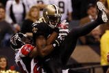 NEW ORLEANS - NOVEMBER 2:  Marques Colston #12 of the New Orleans Saints catches a pass for a touchdown against Tye Hill #24 of the Atlanta Falcons during the second quarter of the game at the Louisiana Superdome on November 2, 2009 in New Orleans, Louisiana. (Photo by Chris Graythen/Getty Images)
