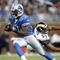 DETROIT , MI - NOVEMBER 01: Kevin Smith #34 of the Detroit Lions gets around Paris Lenon #53 of the St. Louis Rams on November 1, 2009 at Ford Field in Detroit, Michigan.  (Photo by Gregory Shamus/Getty Images)