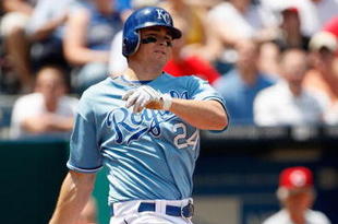 KANSAS CITY, MO - JUNE 14:  Mark Teahen #24 of the Kansas City Royals bats against the Cincinnati Reds during the game on June 14, 2009 in Kansas City, Missouri. (Photo by Jamie Squire/Getty Images)
