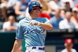 KANSAS CITY, MO - JUNE 14:  Mark Teahen #24 of the Kansas City Royals bats against the Cincinnati Reds during the game on June 14, 2009 in Kansas City, Missouri. (Photo by Jamie Squire/Getty Images)