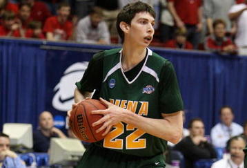 DAYTON, OH - MARCH 20: Ryan Rossiter #22 of the Siena Saints handles the ball against the Ohio State Buckeyes during the first round of the NCAA Division I Men's Basketball Tournament at the University of Dayton Arena on March 20, 2009 in Dayton, Ohio.  (Photo by Andy Lyons/Getty Images)