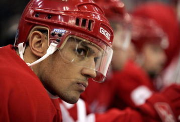 DETROIT - DECEMBER 1:  Steve Yzerman #19 of the Detroit Red Wings looks on from the bench against the Calgary Flames on December 1, 2005 at Joe Louis Arena in Detroit, Michigan.  Calgary won 3-2.  (Photo by Gregory Shamus/Getty Images)