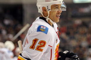 DALLAS - NOVEMBER 04: Right wing Jarome Iginla #12 of the Calgary Flames celebrates his goal against the Dallas Stars at American Airlines Center on November 4, 2009 in Dallas, Texas. (Photo by Ronald Martinez/Getty Images)