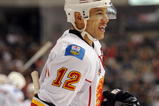 DALLAS - NOVEMBER 04:  Right wing Jarome Iginla #12 of the Calgary Flames celebrates his goal against the Dallas Stars at American Airlines Center on November 4, 2009 in Dallas, Texas.  (Photo by Ronald Martinez/Getty Images)